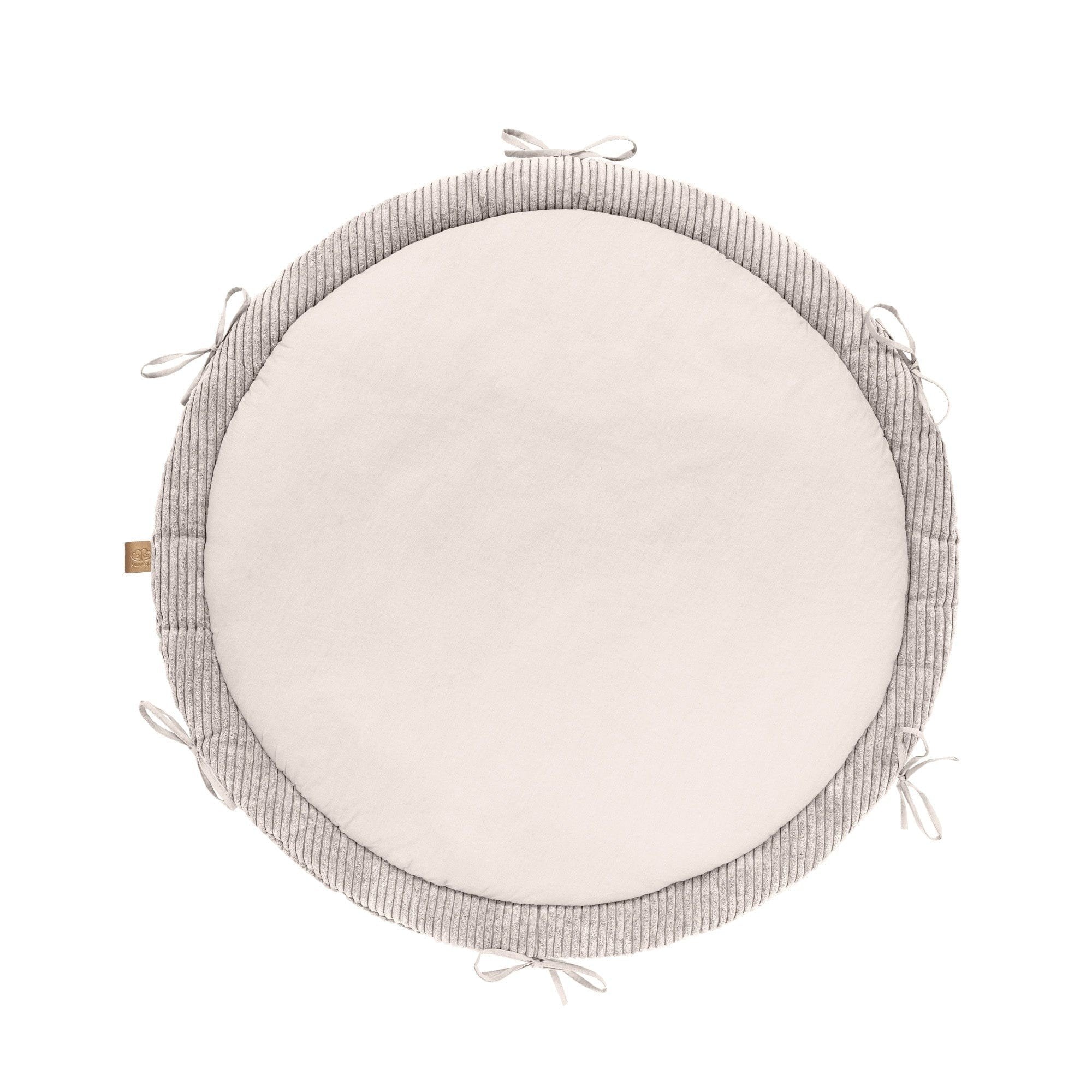 3. Vanilla play mat with smooth center and ribbed corduroy edge, shown from above