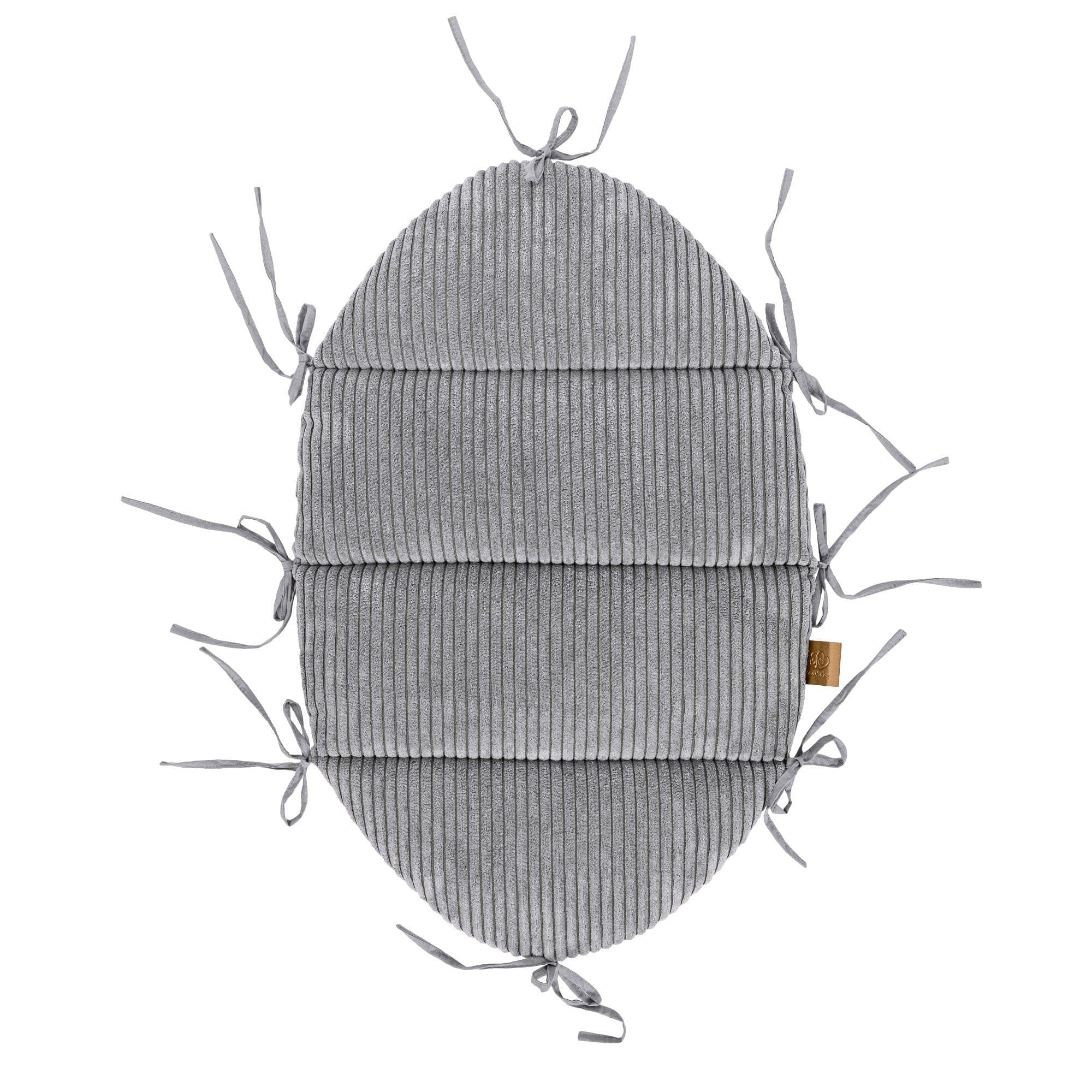 2. Studio shot of grey corduroy baby mat with fabric ties, designed for use with braided bumper