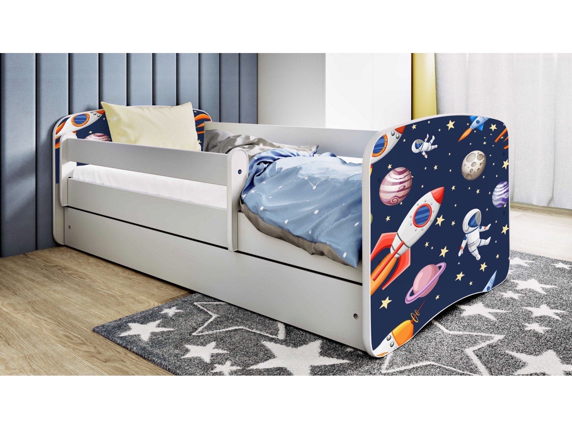 6. Children's bed with cosmos theme in bedroom setting, featuring space graphics and bedding