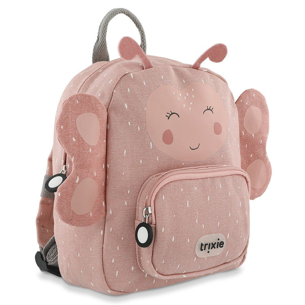 3. Side view of pink butterfly-themed children's backpack with smiling face and Trixie logo