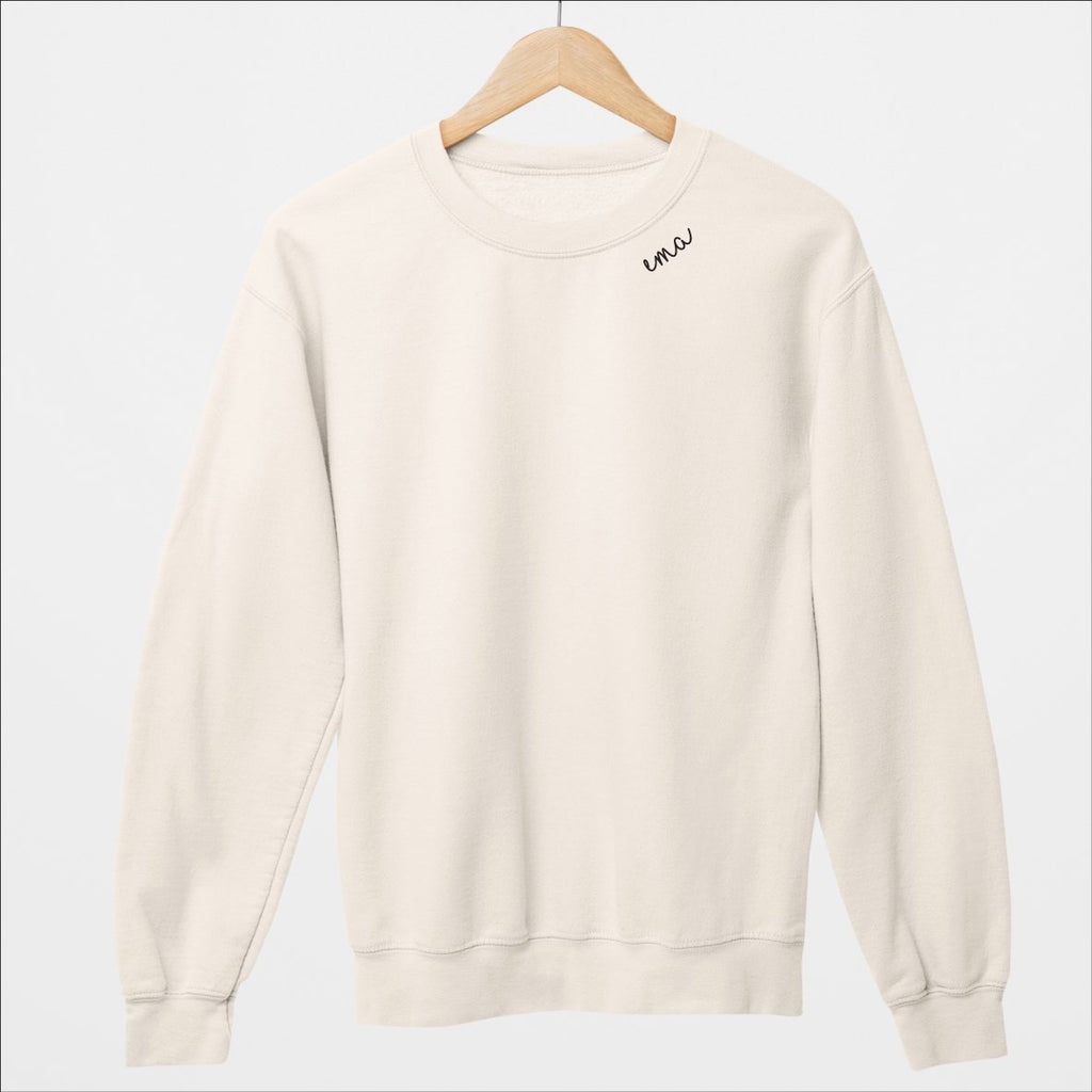 4. Beige embroidered collar organic cotton sweatshirt by Beebila on hanger, studio shot
