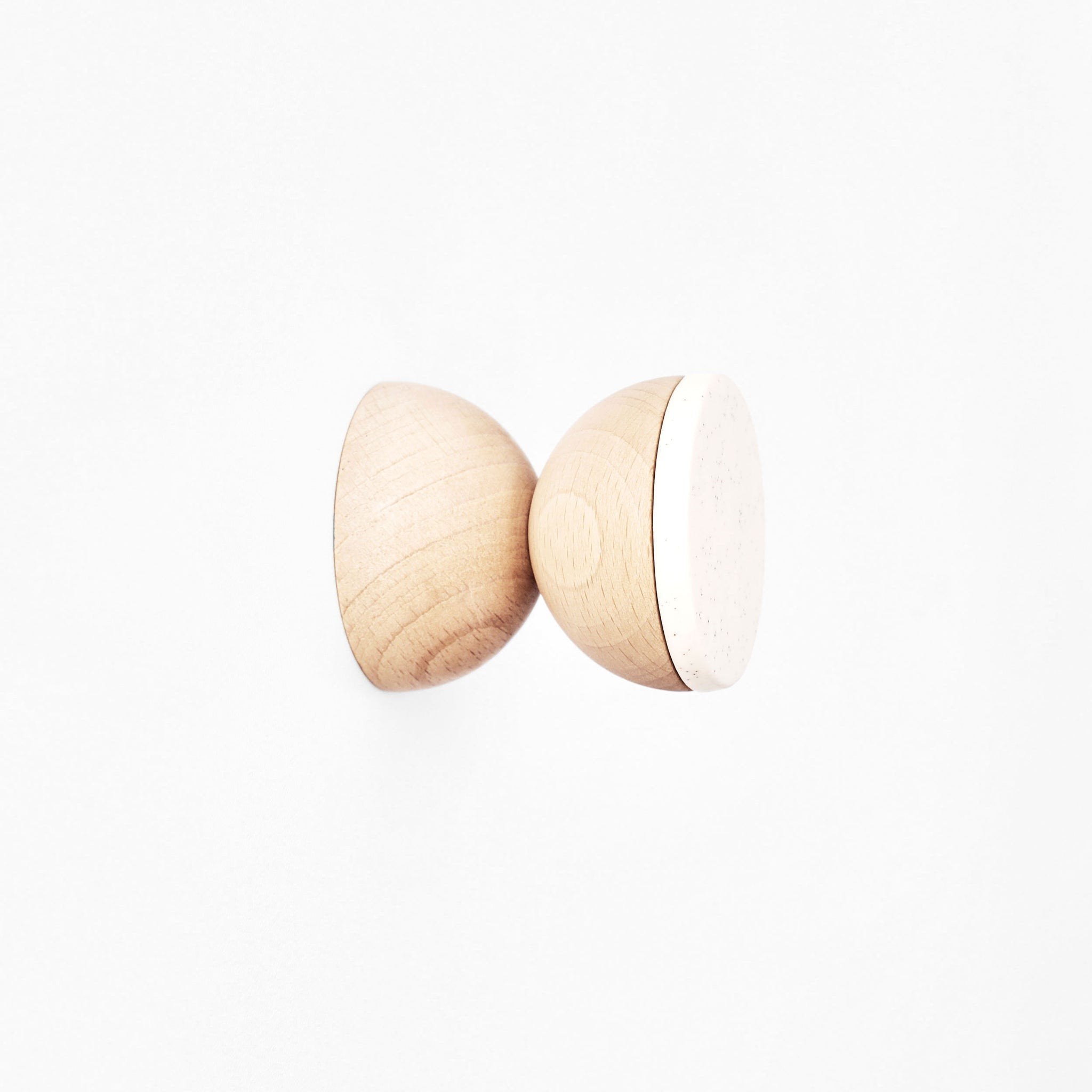 4. Close-up of 5mm Paper Beech Wood & Ceramic Wall Hook in white sand, highlighting material and finish