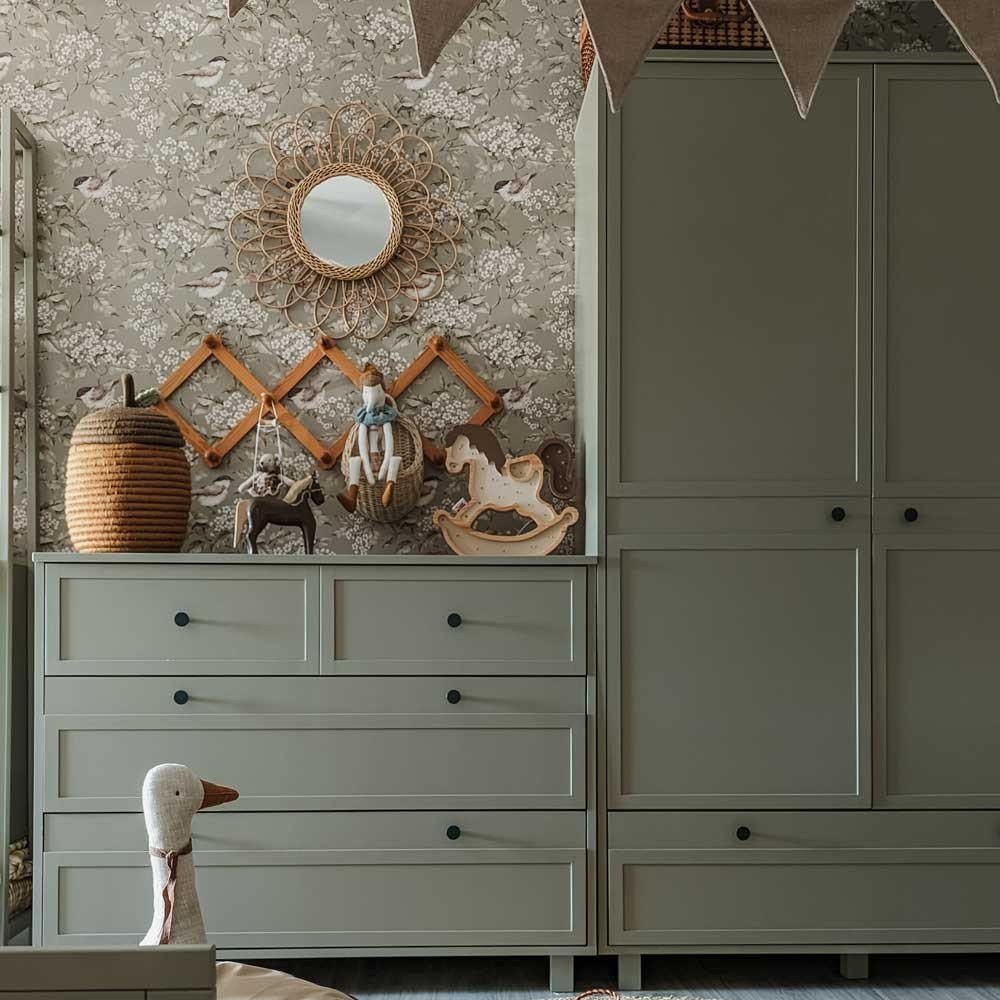 2. Children's room with Dekornik's green spring wallpaper, green dresser, and decorative toys