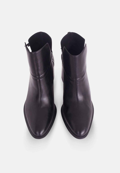 3. Top view of women's black leather ankle boots with pointed toe and block heel on white background