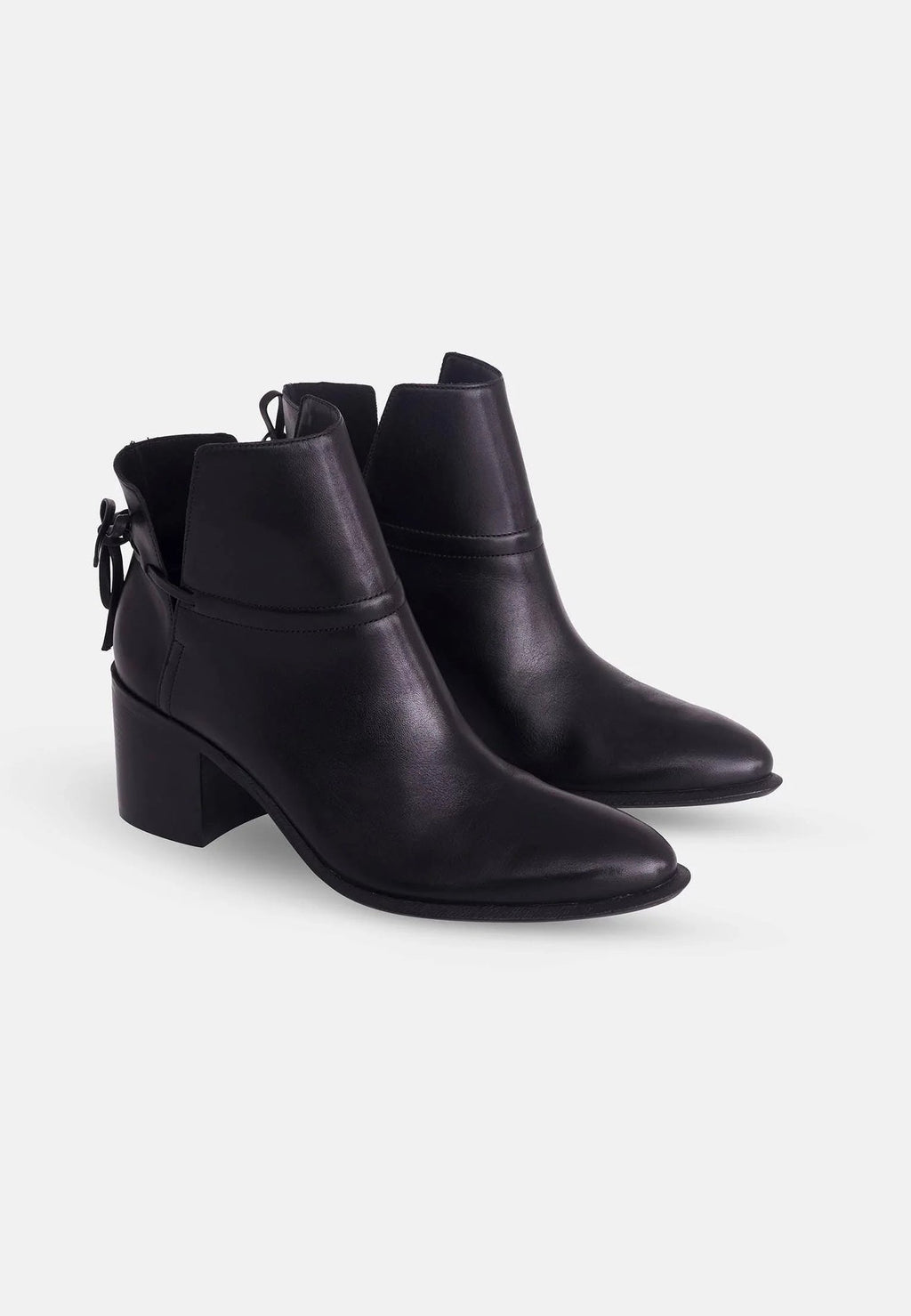 2. Pair of women's black leather ankle boots with block heel shown in three-quarter view on white background