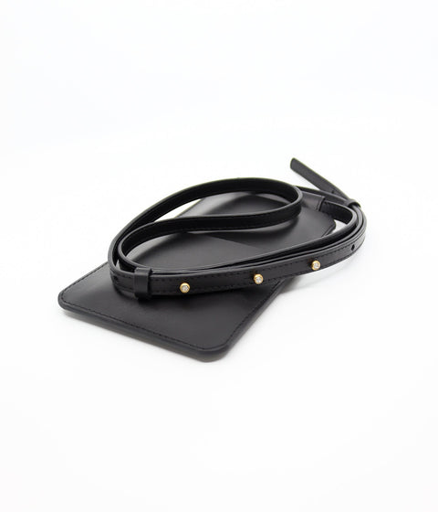 5. Close-up of Tairi Roosve black leather phone bag with gold Sam Browne buttons on strap