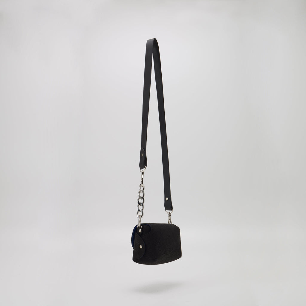 8. Close-up of textured leather on Daz Studio shoulder bag, highlighting craftsmanship