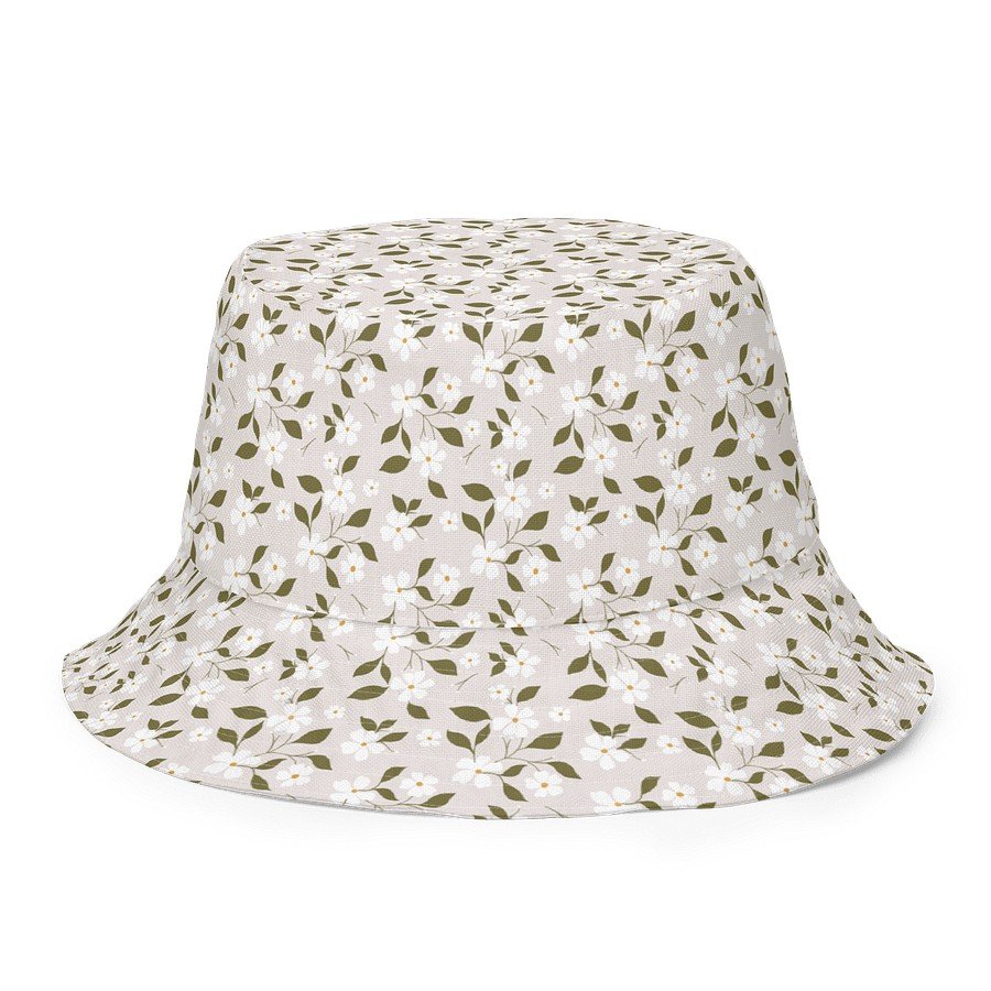 1. Blossom Breeze reversible bucket hat with beige floral pattern, made from breathable linen-feel polyester fabric