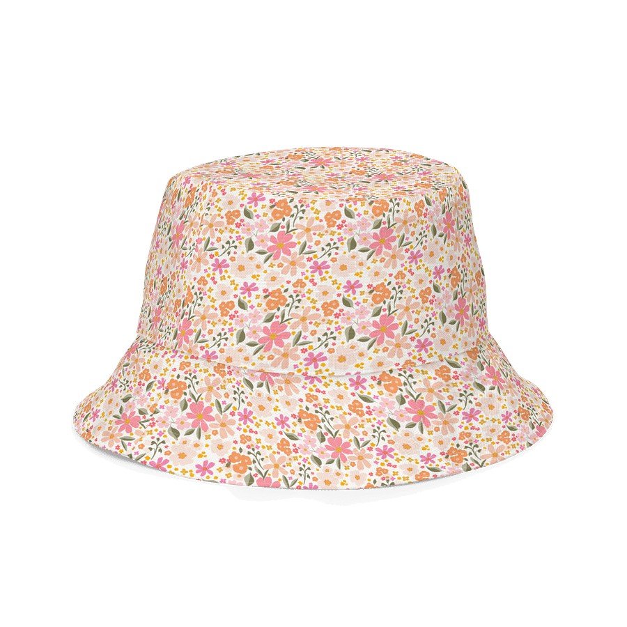 2. Blushing Blossom reversible bucket hat with pink and orange floral pattern on beige background