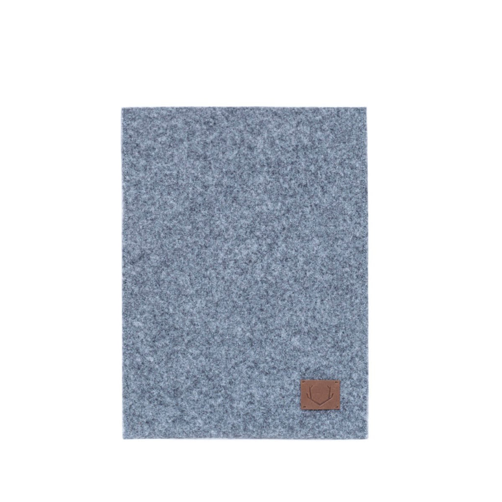 3. Front view of Nordhale Bodem grey laptop sleeve with felt texture and logo