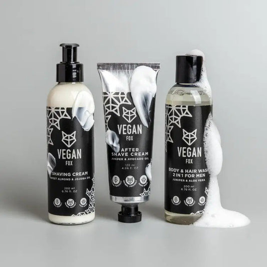 2. Vegan Fox grooming set featuring Body & Hair Wash 2in1 for Men, Shaving Cream, and After Shave Cream, shown in studio with foam detail