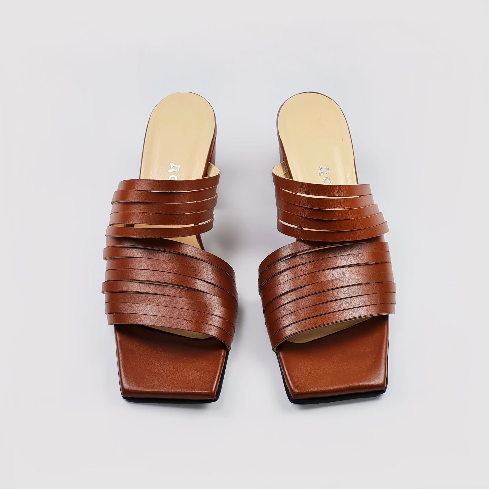1. Top view of Daz Studio handmade brown strappy leather sandals with squared toe and 6 cm heel