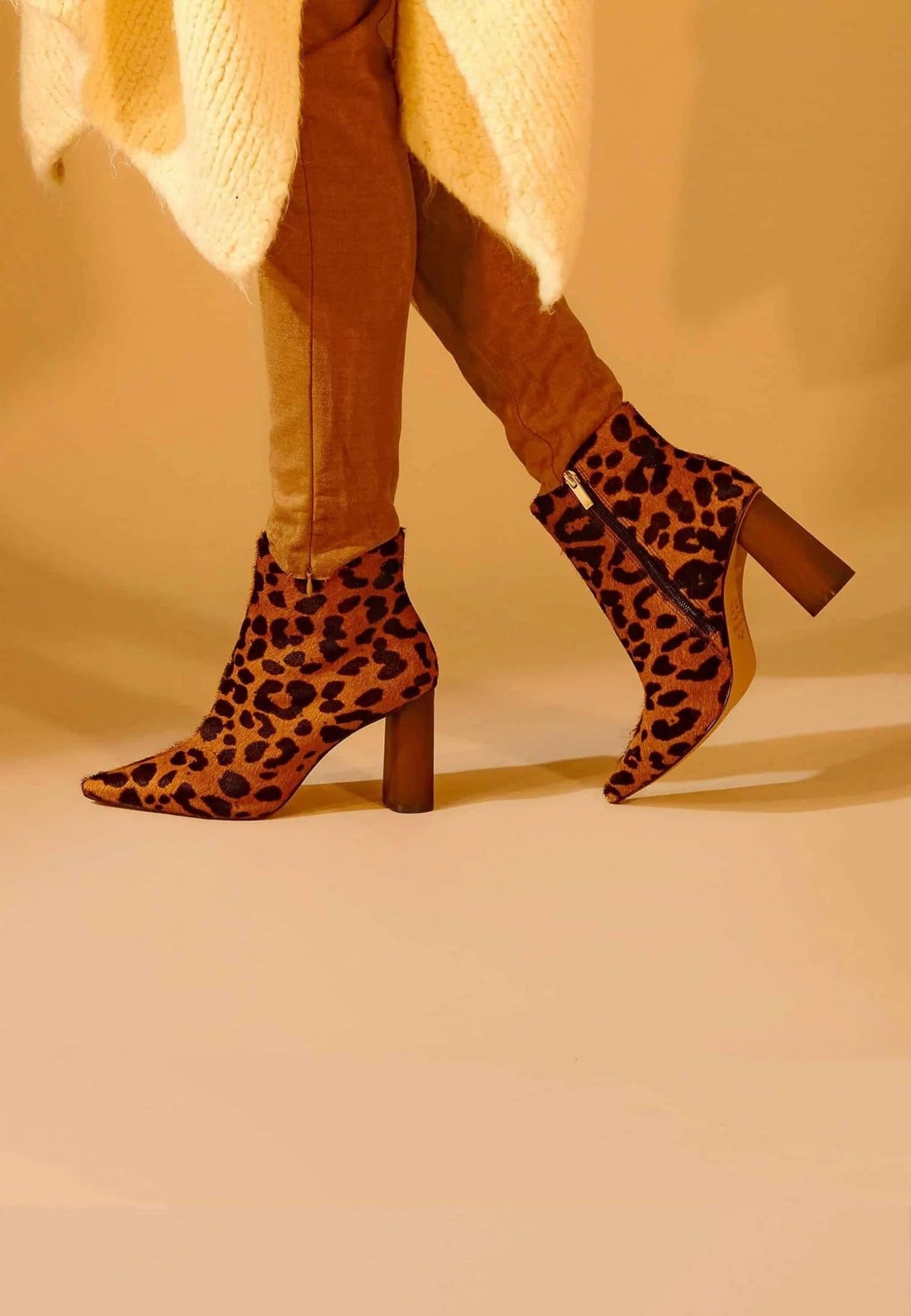 2. Brown animal print ankle boots with 8.4 cm block heel, side view on white background highlighting design
