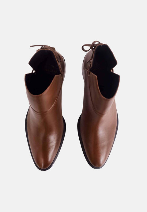 3. Top view of women's brown leather ankle boots with block heels showing design and structure