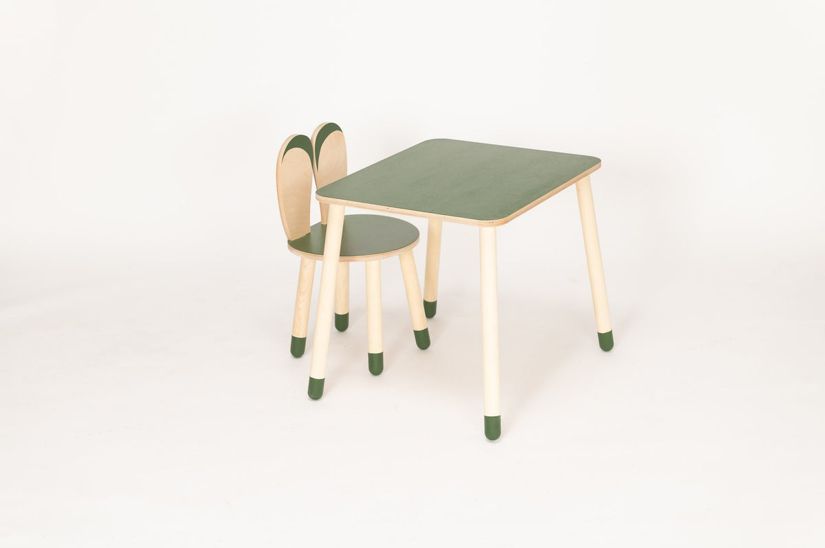 1. Green and natural wood bunny table and chair set in a studio setting, highlighting rounded corners and sturdy design