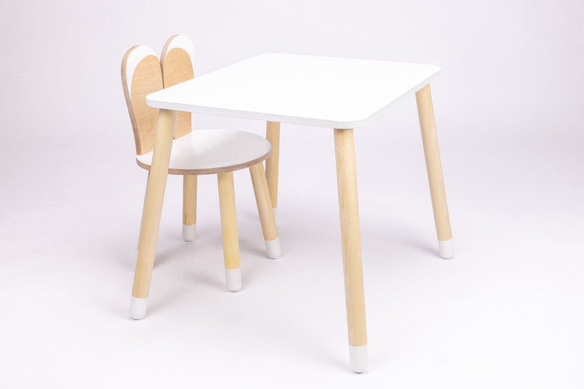 2. Studio shot of white and natural wood bunny-themed table and chair set with rounded edges