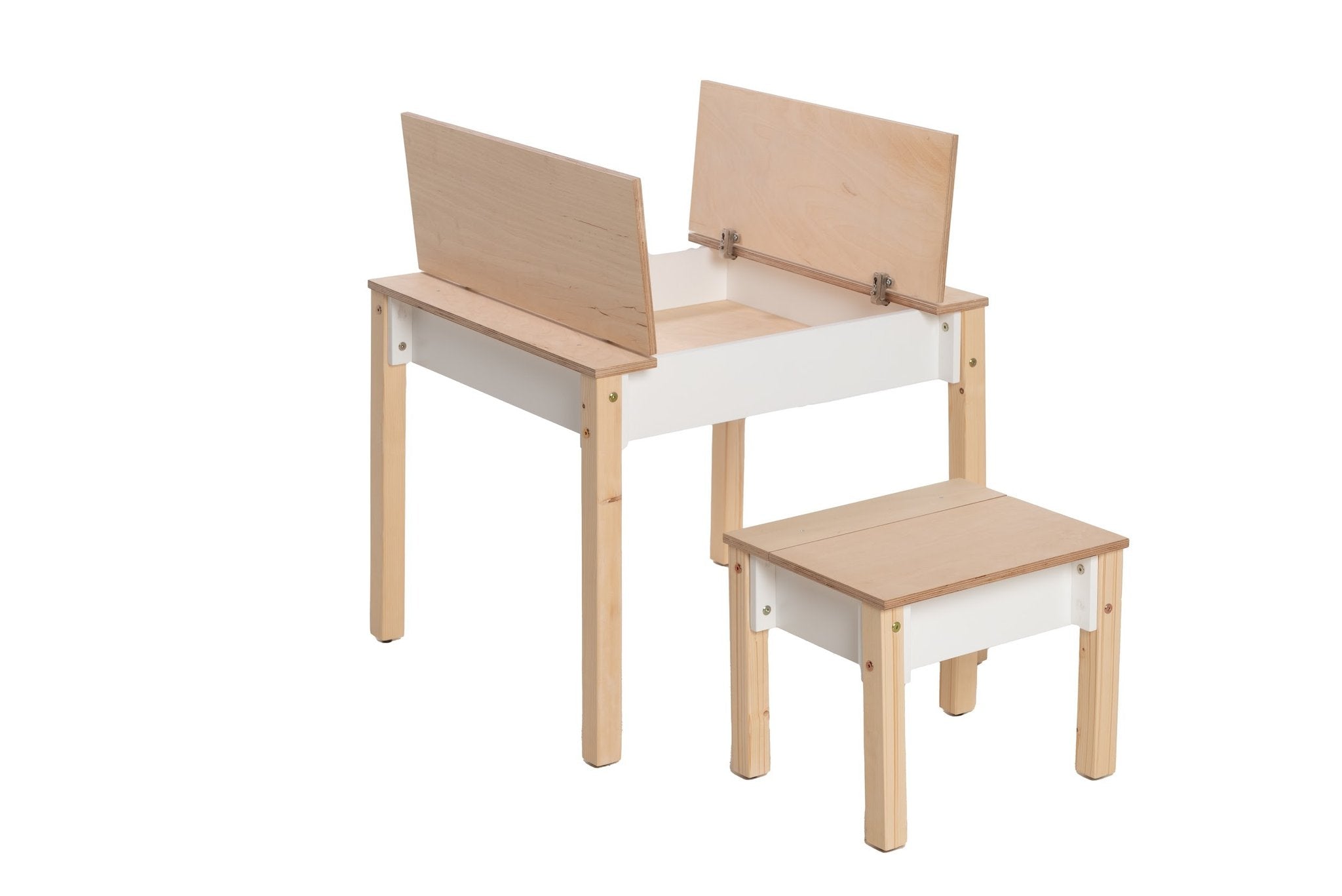 1. Two girls sitting at smart storage table and chair set in a playroom with teal walls
