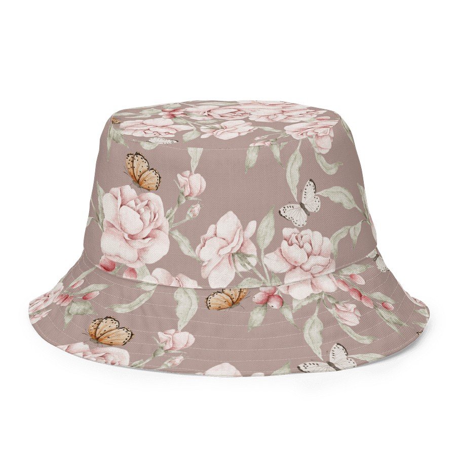 3. Close-up of Butterfly Blooms reversible bucket hat showing detailed floral and butterfly design on green fabric