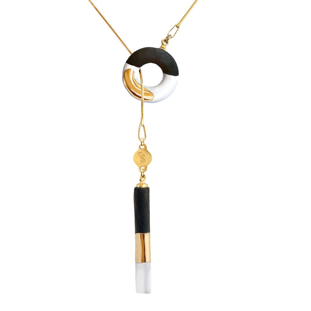 3. Close-up of SCULP OM Choker B&W showing hand-made ceramic pendant and gold details