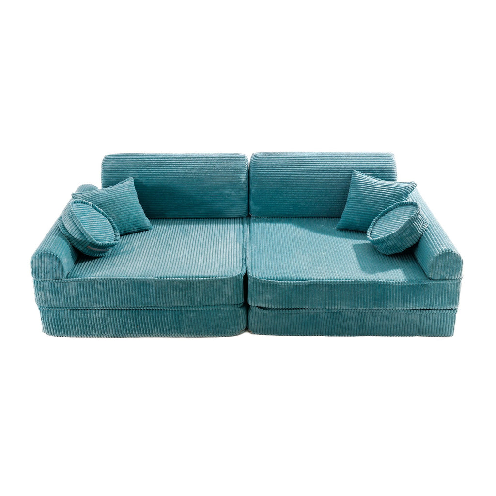 6. Turquoise corduroy modular sofa for kids in a standard seating arrangement with cushions