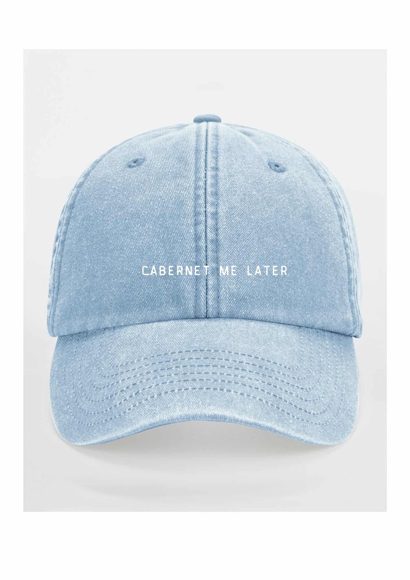 5. Light blue cap with 'Cabernet Me Later' text on clean white background