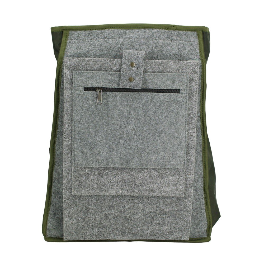 6. Interior view of Noel Cafe Backpack, showing zippered pocket and felt lining, studio setting