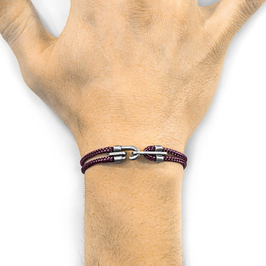 1. Unisex Canterbury silver and rope bracelet in aubergine purple worn on wrist, showcasing sterling silver clasp