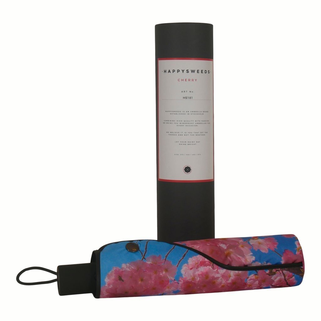3. Cherry Blossom umbrella in packaging with floral cover and HAPPYSWEEDS branding