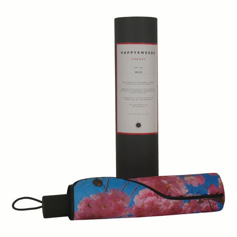 3. Cherry Blossom umbrella in packaging with floral cover and HAPPYSWEEDS branding