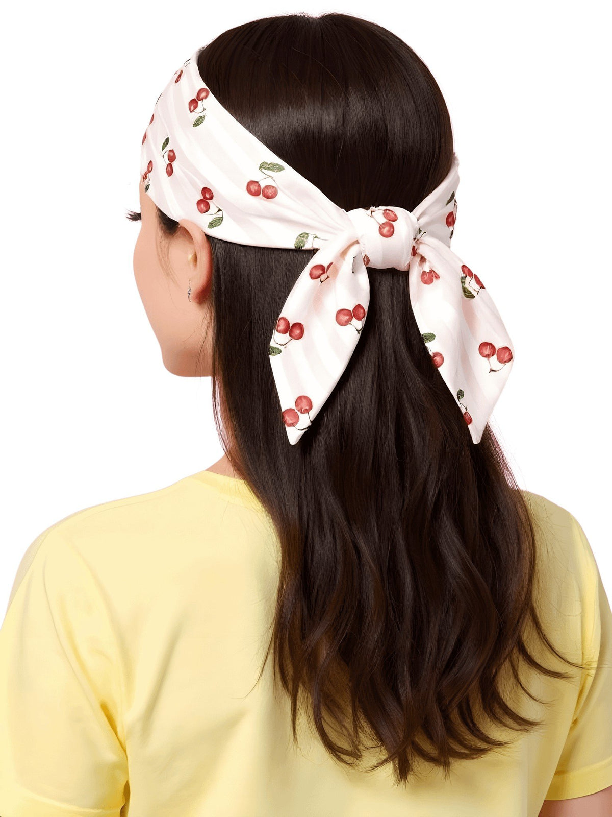 1. Woman wearing cherry-patterned bandana tied at back, showcasing long dark hair and yellow shirt