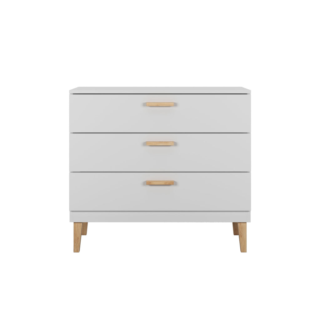 2. White chest of drawers with three oak-handled drawers and solid oak legs, shown in a studio setting