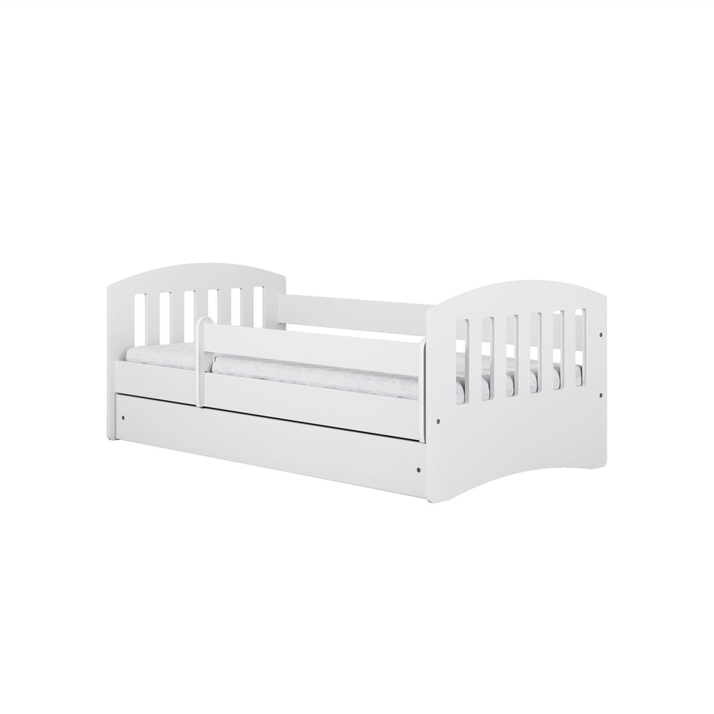 5. Studio shot of white children's bed with guardrail and storage drawer