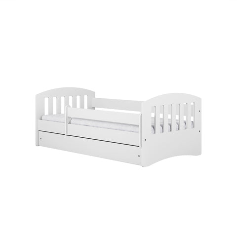5. Studio shot of white children's bed with guardrail and storage drawer