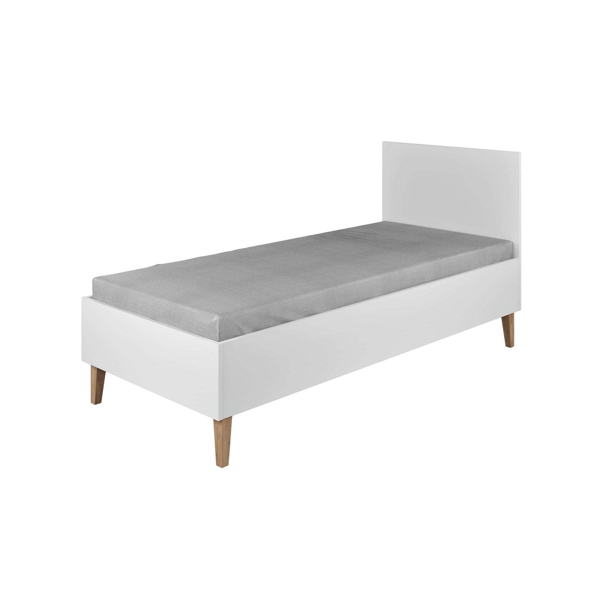 2. Angled view of white Kubi children's bed with grey mattress and oak legs in a studio setting