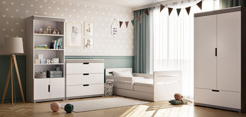5. Children's room featuring Kocot Kids Tomi wardrobe, bed, and shelving unit in white with grey accents