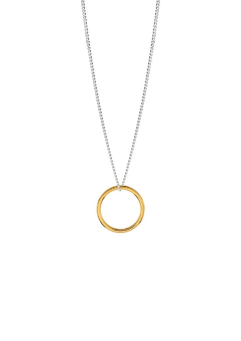 3. Studio shot of gold circle pendant necklace on a silver chain, emphasizing minimalist design and gold vermeil material