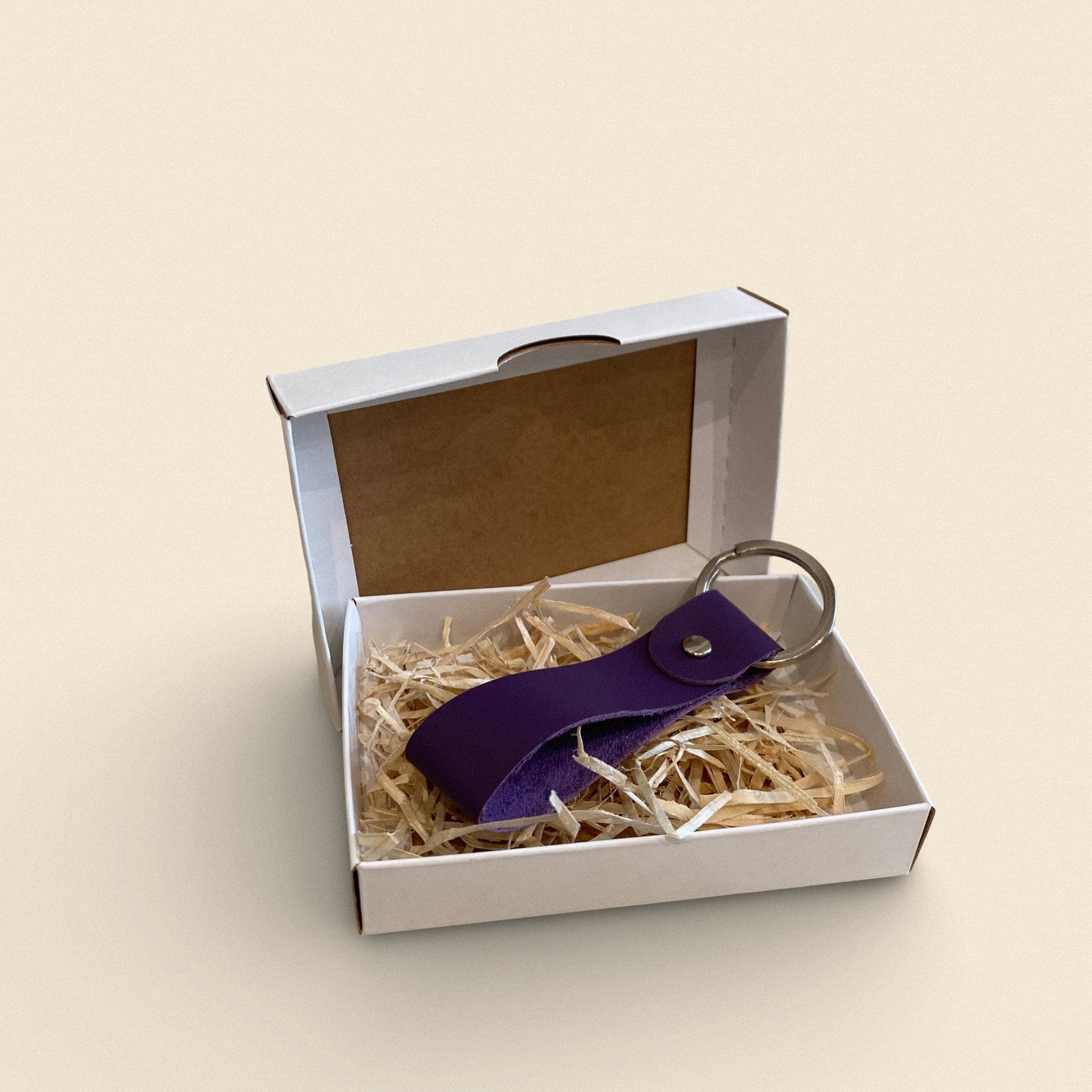 2. Violet handmade leather keychain by Yoru in white gift box with straw filling