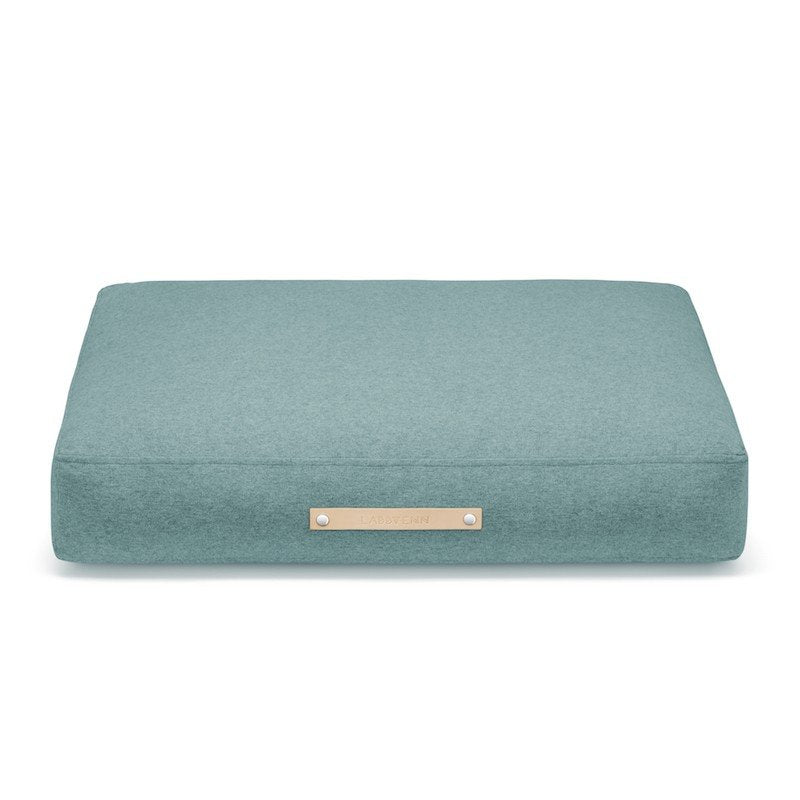2. Studio shot of Labbvenn Copenhagen Cushion in azure color with leather label on clean white background