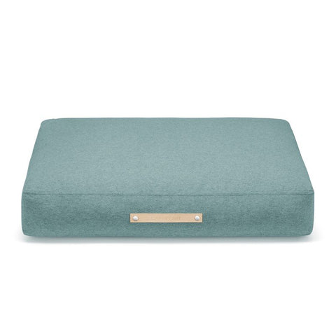 2. Studio shot of Labbvenn Copenhagen Cushion in azure color with leather label on clean white background