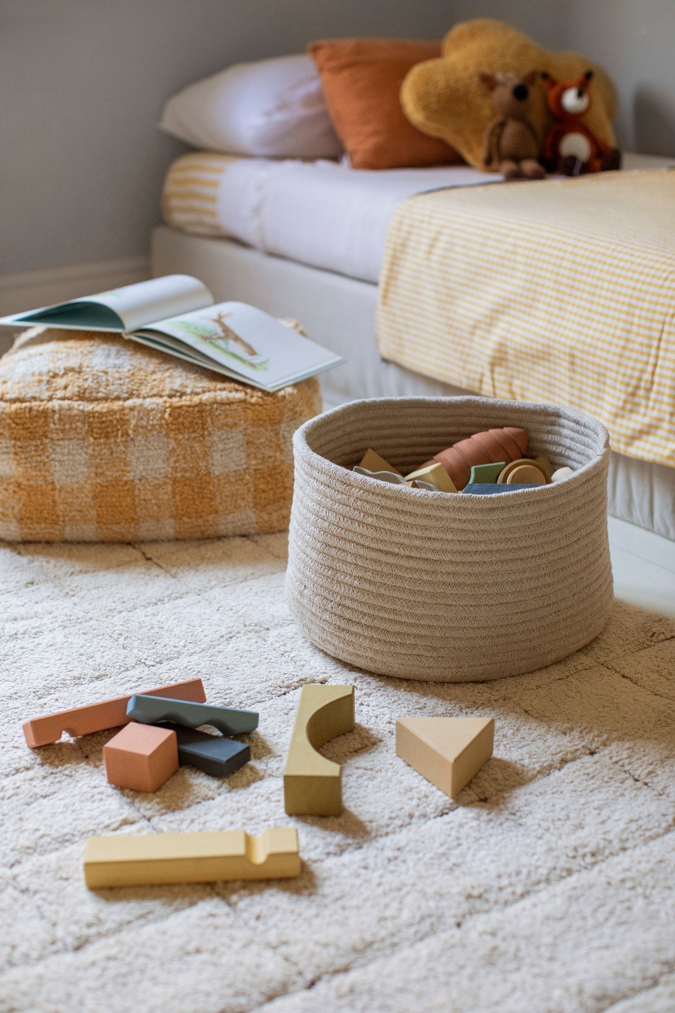 5. Children's room with toys and Lorena Canals mosaic cotton rug on floor