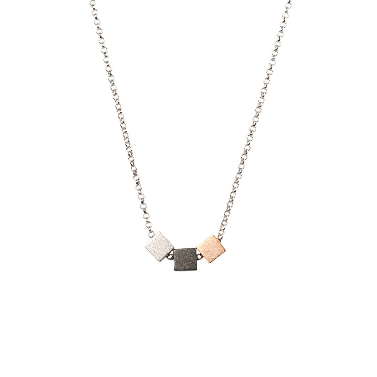 1. MyaMoon Satin Cube Choker in rhodium and rose gold plating, featuring 925 silver chain with cube accents, shown in studio