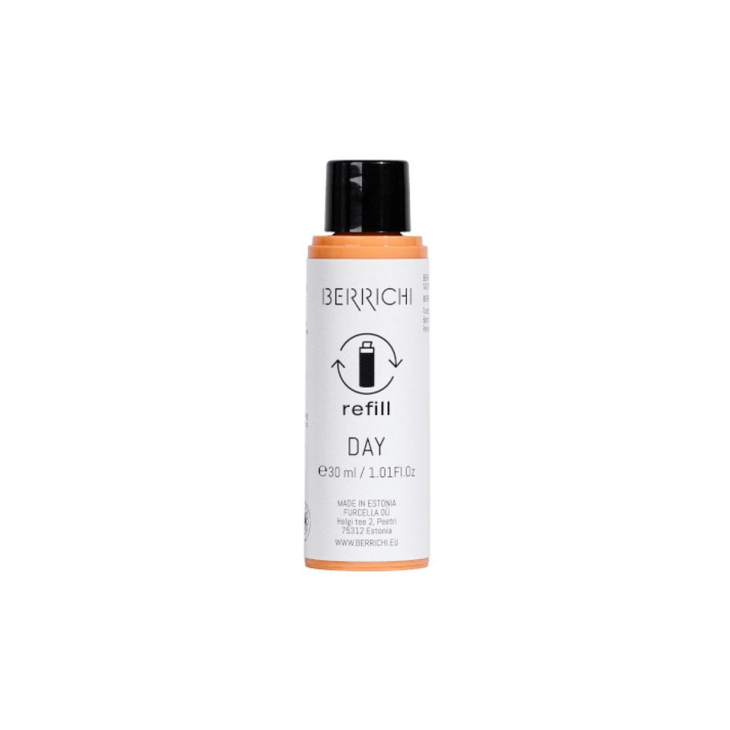 4. Close-up of Berrichi Day Cream texture, showing velvety orange formula