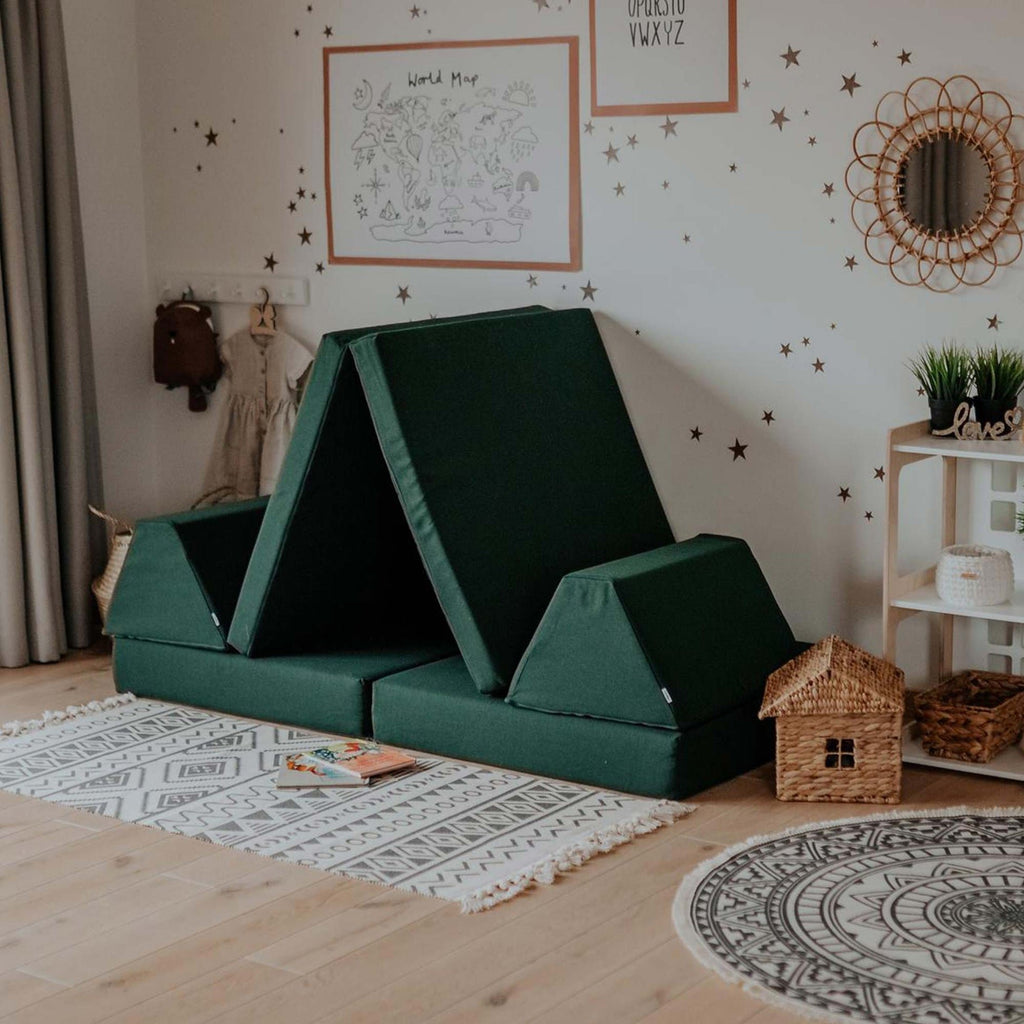 2. Monboxy deep green play mattress set arranged as a tent in a decorated room