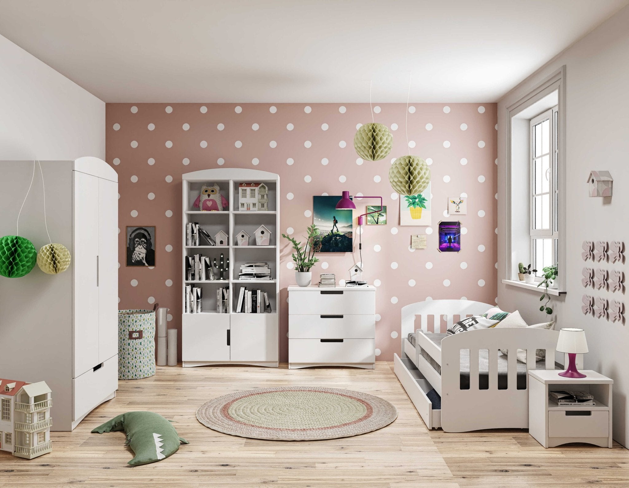 1. White Kocot Kids Julia double bookshelf in a decorated children's room with polka dot walls and various furniture