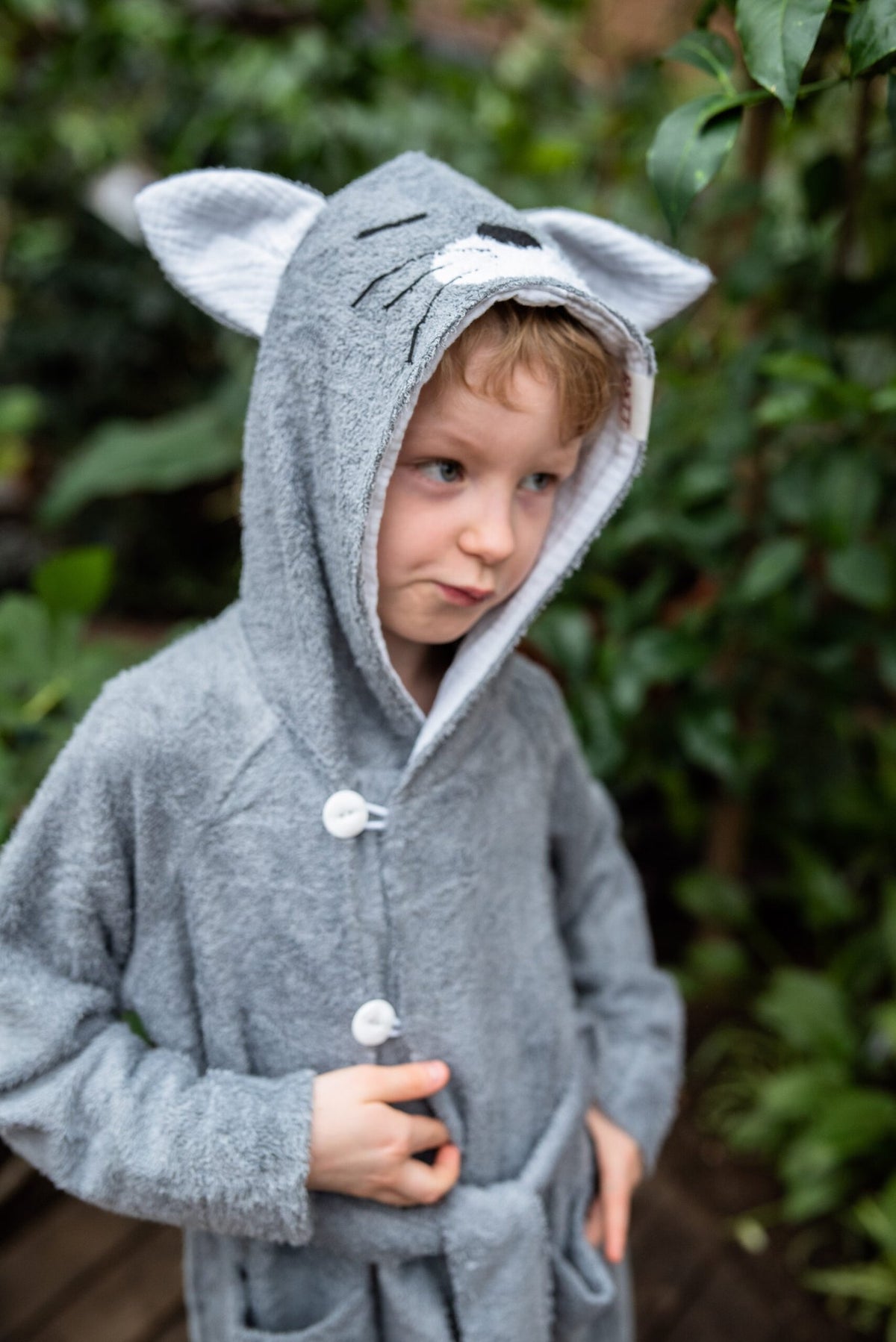 2. Child in gray RÄTT Bamboo Terry Bathrobe CAT with hood, outdoors