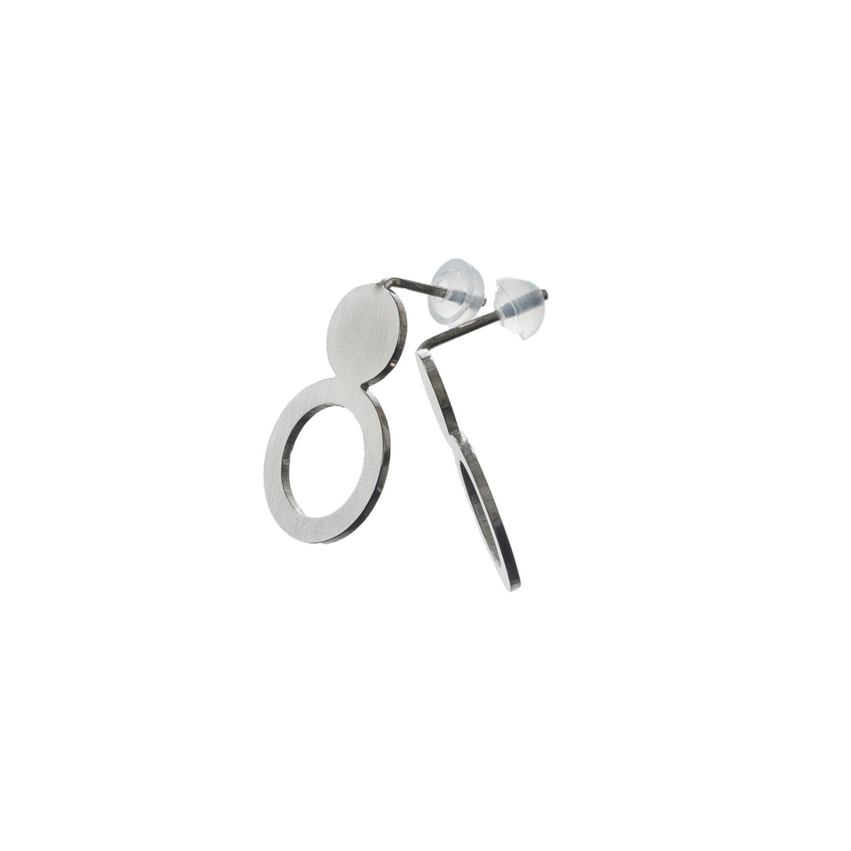 3. Close-up of Lentsius silver stainless steel earrings with brushed surface and silicone stoppers