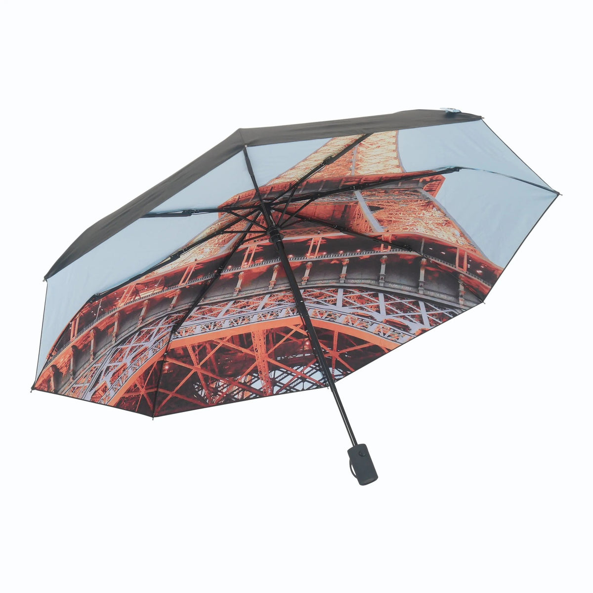 1. Eiffel Umbrella with Eiffel Tower print open against a white background, showcasing windproof design and UPF50+ protection