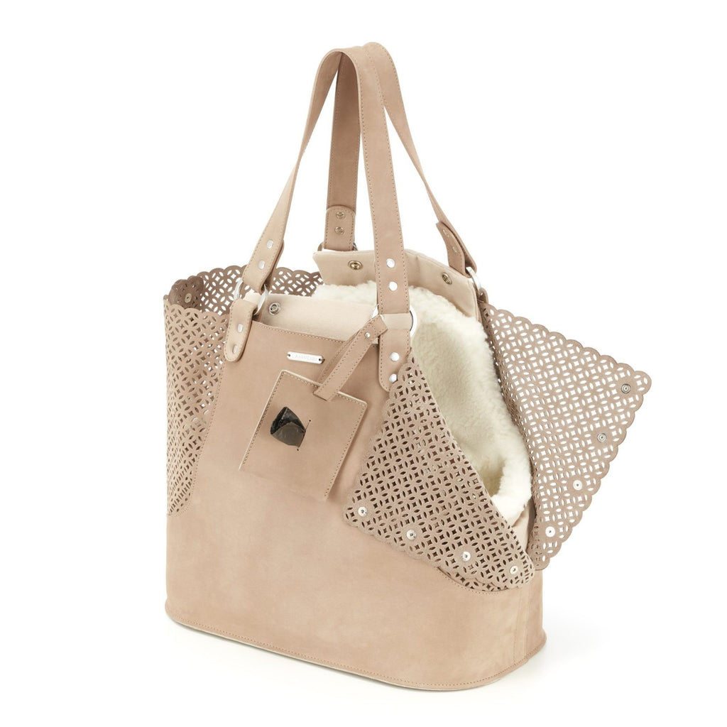 3. Close-up of nude Nubuck leather Elva dog carrier with perforated design and soft interior lining