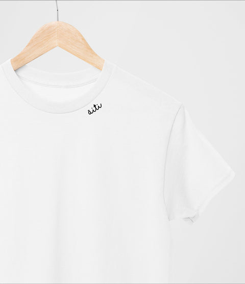 2. White Beebila embroidered collar organic cotton t-shirt on hanger, highlighting unisex style