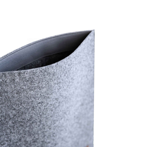 4. Close-up of Nordhale Bodem 13' grey laptop sleeve showing interior and felt texture